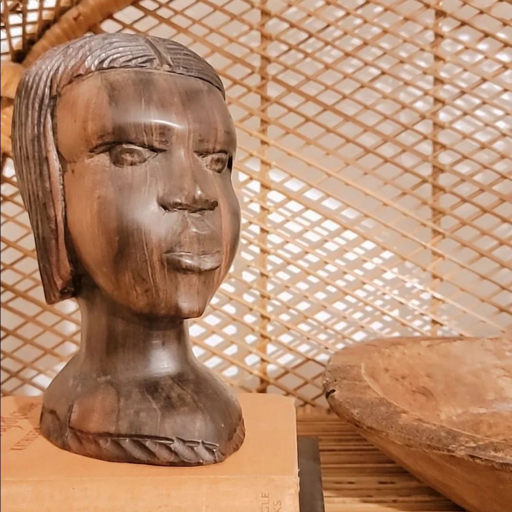 Unique wood carved piece. Lovely.